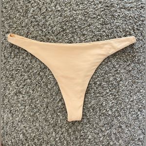 Toast Stone Fox Swim signature skimpy bikini bottom 
Small. 
Peach quartz.